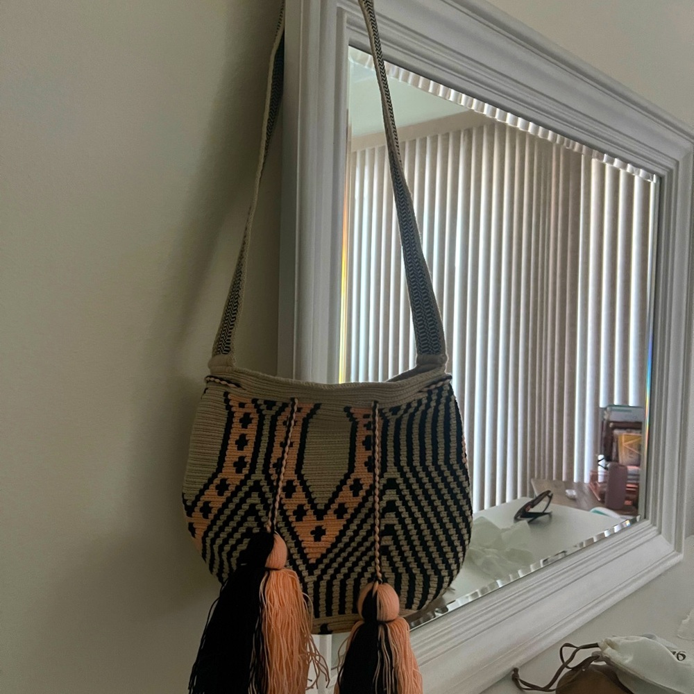 Peach and black woven bohemian bag